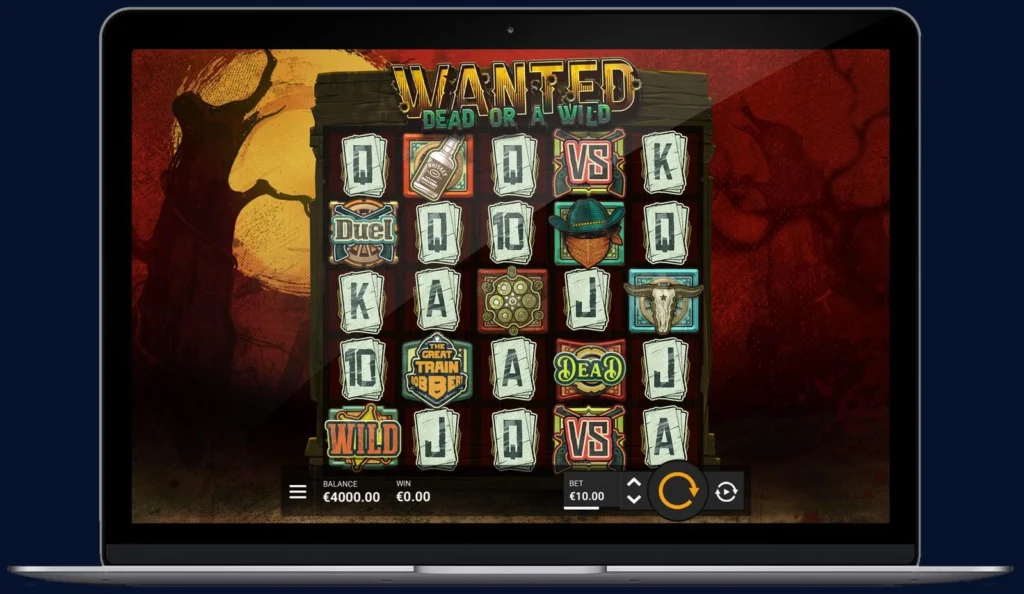 Wanted Dead or a Wild slot by Hacksaw Gaming shown on a laptop with the 5x5 reels and bet panel